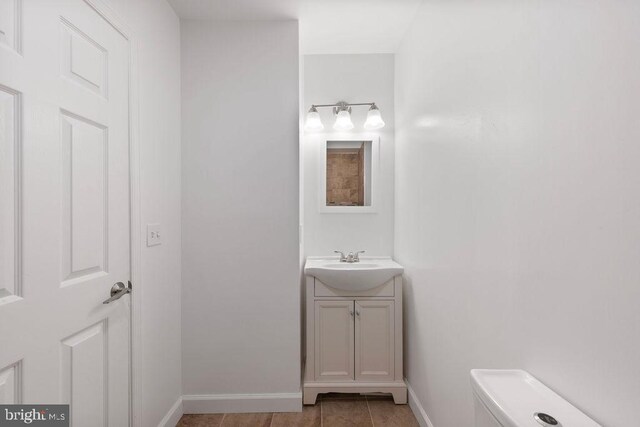 1815 N Warwick Ave, Baltimore, MD 21216 - bathroom with vanity and tile patterned flooring