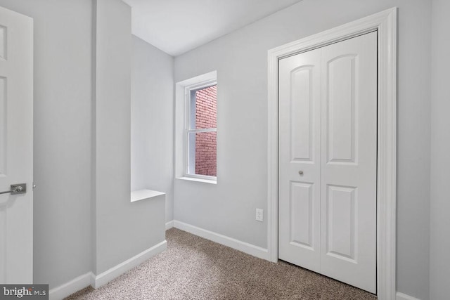 1815 N Warwick Ave, Baltimore, MD 21216 - unfurnished bedroom featuring carpet and a closet