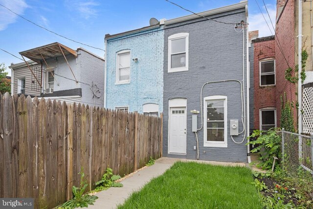 1815 N Warwick Ave, Baltimore, MD 21216 - view of front of house with brick siding