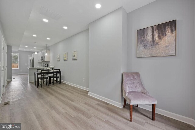 1815 N Warwick Ave, Baltimore, MD 21216 - dining area with recessed lighting and light wood-type flooring