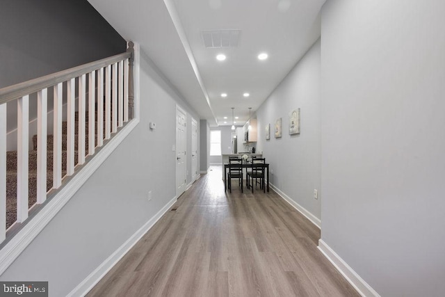 1815 N Warwick Ave, Baltimore, MD 21216 - corridor featuring light wood finished floors, recessed lighting, and stairway