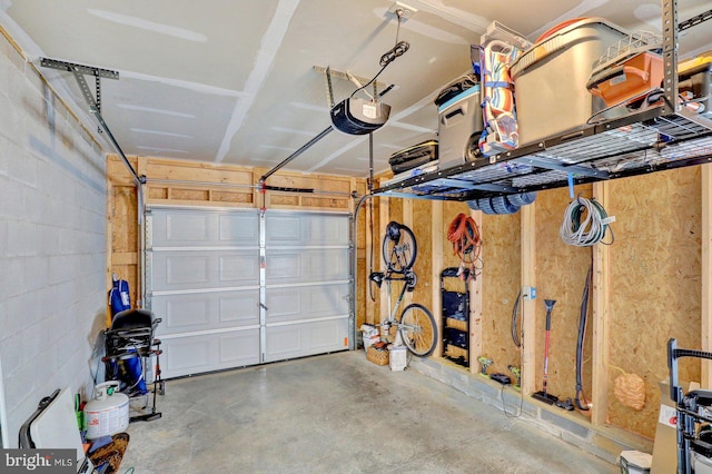 732 Farmwood Ln, Lebanon, PA 17042 - garage featuring a garage door opener and concrete block wall