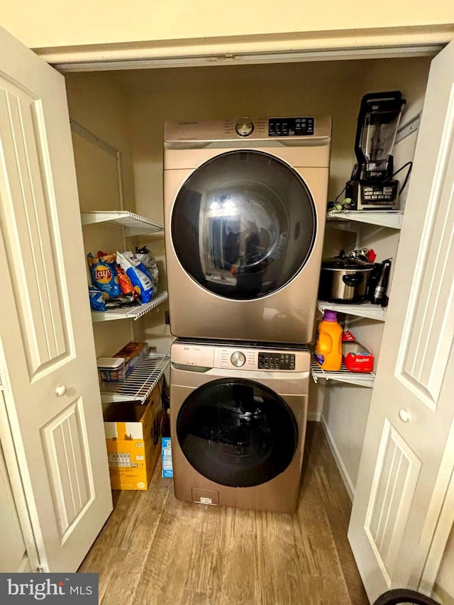 732 Farmwood Ln, Lebanon, PA 17042 - washroom with estacked washer and dryer and wood finished floors