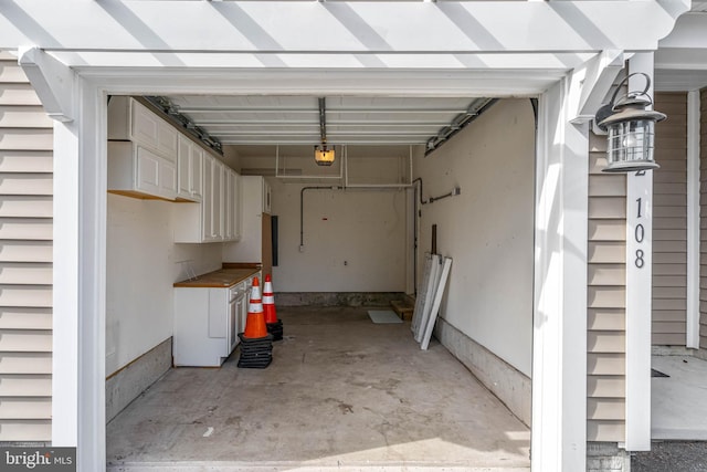 2 Smithfield Ct Unit 8, Ocean View, DE 19970 - garage featuring a garage door opener