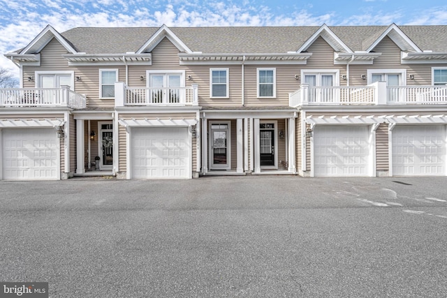 2 Smithfield Ct Unit 8, Ocean View, DE 19970 - multi unit property with a balcony, an attached garage, and french doors