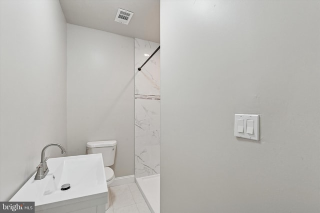 2419 Arlington St, Philadelphia, PA 19121 - bathroom with a marble finish shower and vanity