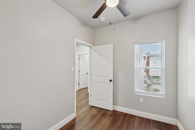 2419 Arlington St, Philadelphia, PA 19121 - unfurnished bedroom with dark wood-style floors and a ceiling fan
