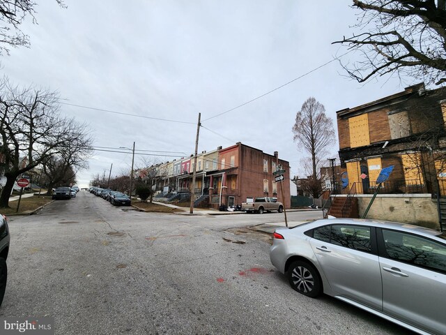 2221 Cedley St, Baltimore, MD 21230 - view of asphalt street with traffic signs, sidewalks, and curbs