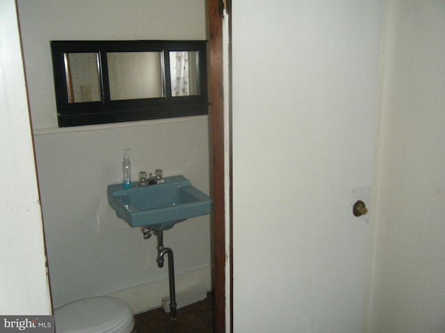 213 S 58th St, Philadelphia, PA 19139 - half bath featuring a sink and toilet