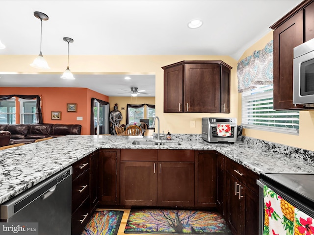 1811 Hilltop Ave, Baltimore, MD 21221 - kitchen featuring appliances with stainless steel finishes, plenty of natural light, light stone countertops, and recessed lighting