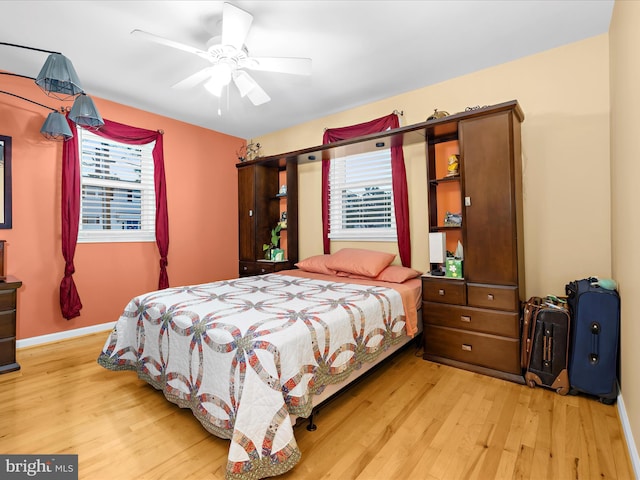 1811 Hilltop Ave, Baltimore, MD 21221 - bedroom with light wood-style floors and a ceiling fan