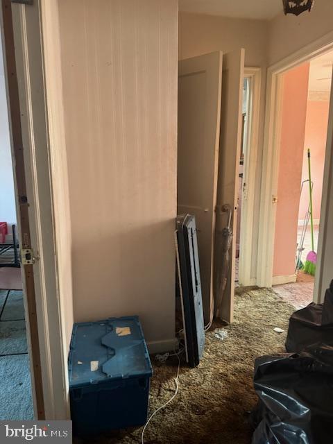 1814 S Newkirk St, Philadelphia, PA 19145 - hallway with radiator heating unit and carpet floors