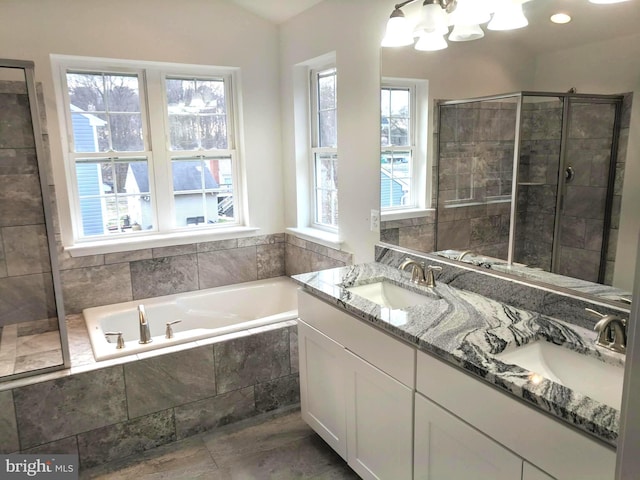 806 Pengrove Ct Lot 54, Bowie, MD 20716 - bathroom with a garden tub, a chandelier, double vanity, and a shower stall