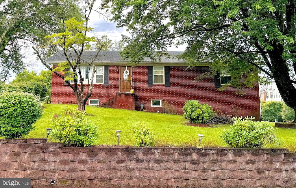 9912 S Grant Ave, Manassas, VA 20110 - rear view of property featuring a yard and brick siding