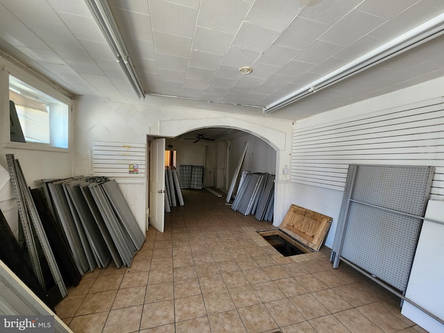 101 S Payson St, Baltimore, MD 21223 - hall featuring arched walkways and light tile patterned floors