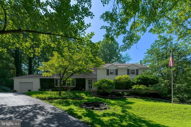 245 Greentree Dr, West Chester, PA 19382 - tri-level home with a garage, driveway, and a front lawn
