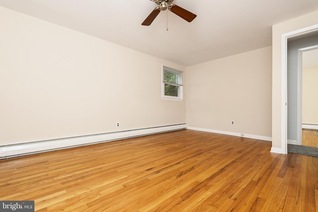 245 Greentree Dr, West Chester, PA 19382 - spare room featuring a ceiling fan, wood finished floors, and baseboard heating