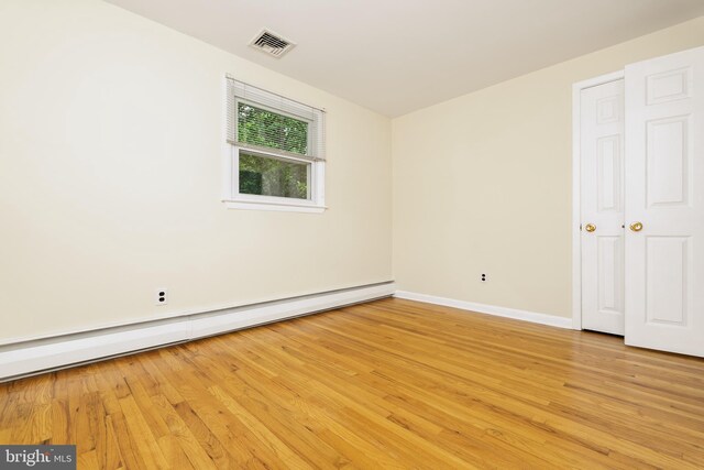 245 Greentree Dr, West Chester, PA 19382 - unfurnished room with a baseboard radiator and light wood finished floors