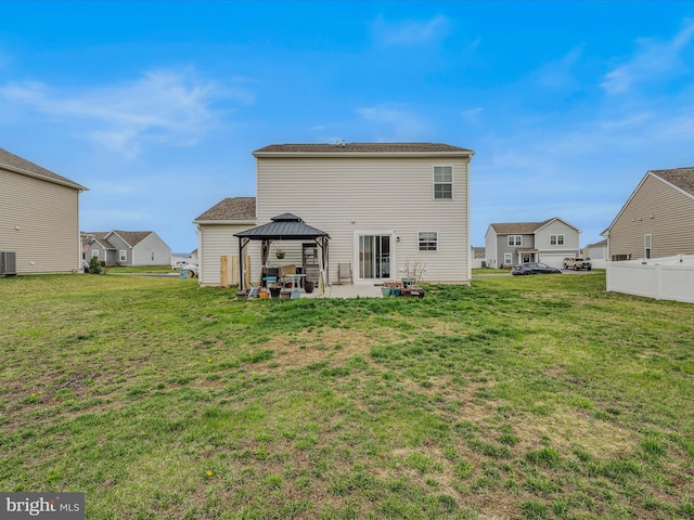 110 Tundra Ct, Bunker Hill, WV 25413 - rear view of house featuring a gazebo, a patio, a yard, and a residential view