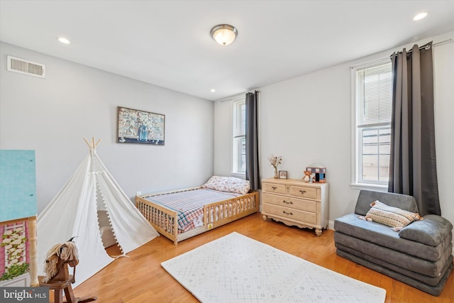 1639 S 19th St, Philadelphia, PA 19145 - bedroom featuring multiple windows, wood finished floors, and recessed lighting