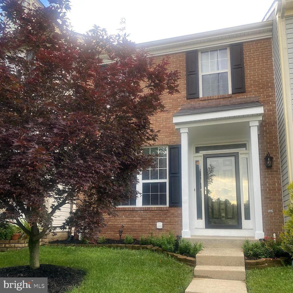 8816 Dove Dr, Perry Hall, MD 21128 - view of exterior entry featuring brick siding