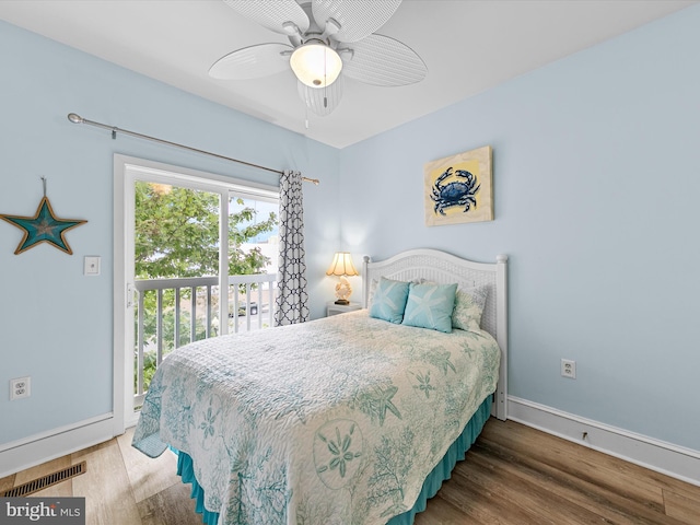 106 69th St Unit 13D, Ocean City, MD 21842 - bedroom featuring access to outside, wood finished floors, and ceiling fan