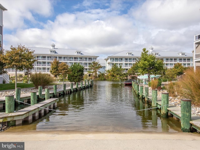 106 69th St Unit 13D, Ocean City, MD 21842 - dock area featuring a boat ramp and a water view
