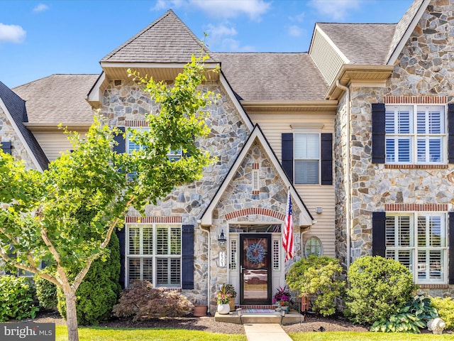 2503 Island Grove Blvd, Frederick, MD 21701 - view of front facade featuring stone siding and a shingled roof