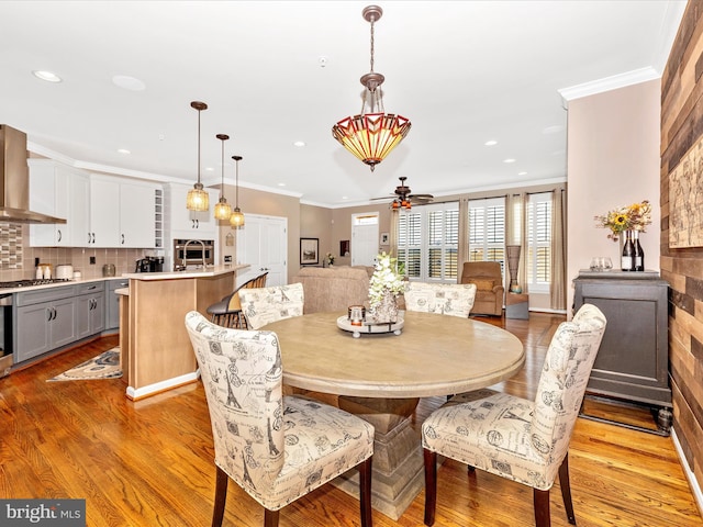 2503 Island Grove Blvd, Frederick, MD 21701 - dining area featuring crown molding, ceiling fan, light wood-style flooring, and recessed lighting