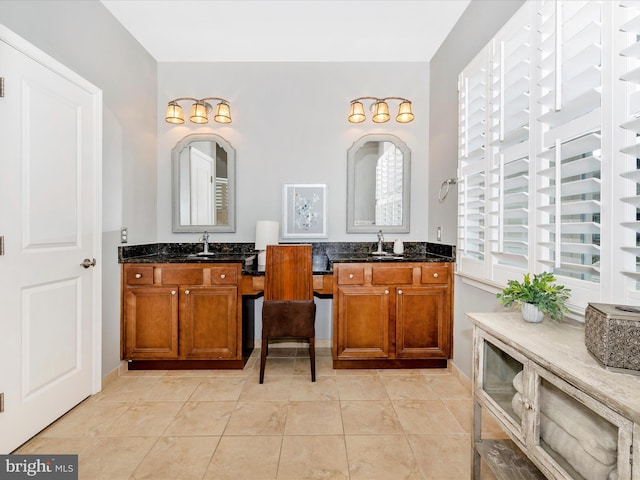 2503 Island Grove Blvd, Frederick, MD 21701 - bathroom with two vanities and tile patterned floors