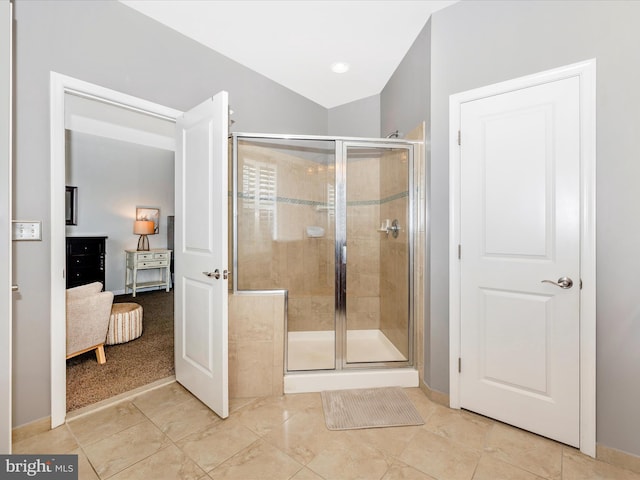 2503 Island Grove Blvd, Frederick, MD 21701 - bathroom featuring a stall shower, tile patterned flooring, and vaulted ceiling