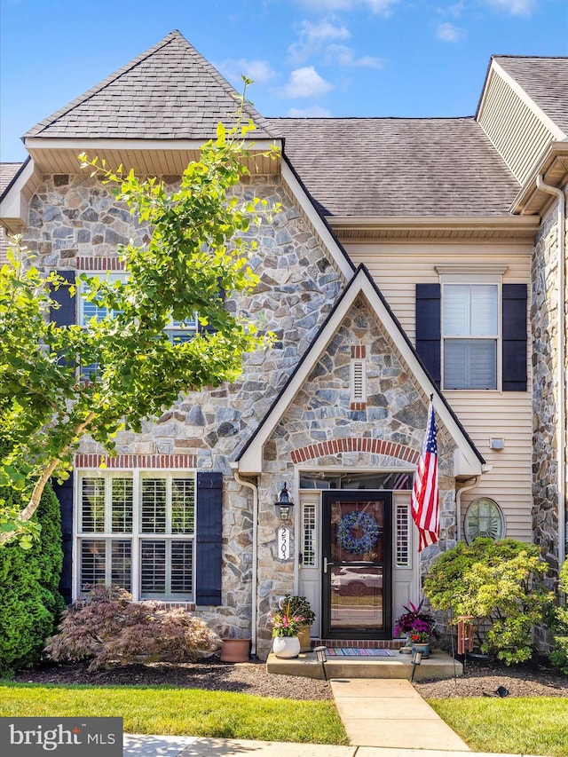 2503 Island Grove Blvd, Frederick, MD 21701 - view of front of house featuring stone siding and roof with shingles