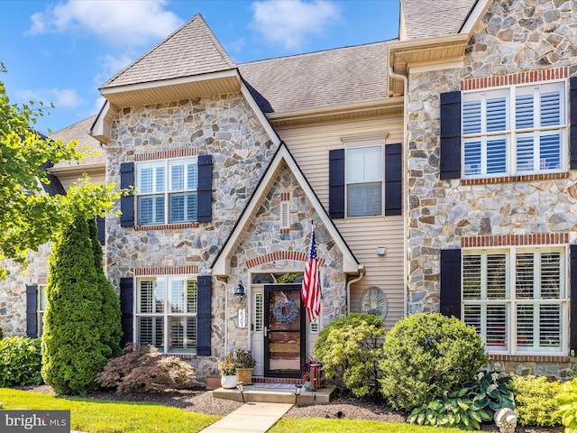 2503 Island Grove Blvd, Frederick, MD 21701 - french country home featuring stone siding and roof with shingles