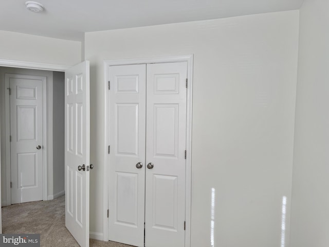 466 Sequoia Dr, Smyrna, DE 19977 - hallway featuring light carpet and baseboards