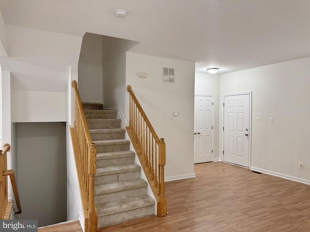 466 Sequoia Dr, Smyrna, DE 19977 - staircase with wood finished floors and baseboards