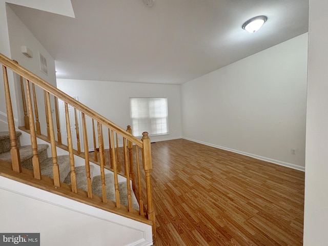 466 Sequoia Dr, Smyrna, DE 19977 - staircase with wood finished floors and baseboards
