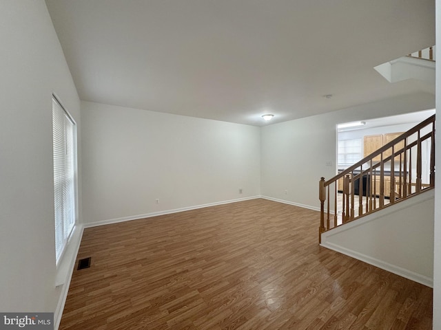 466 Sequoia Dr, Smyrna, DE 19977 - unfurnished room with wood finished floors and stairs