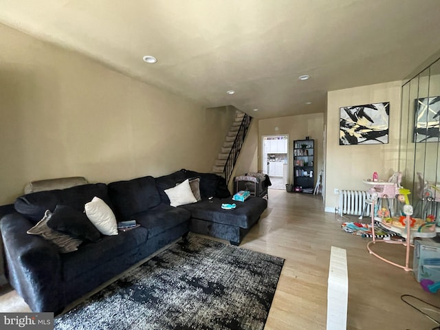 3102 N Taylor St, Philadelphia, PA 19132 - living area featuring wood finished floors, stairway, and recessed lighting