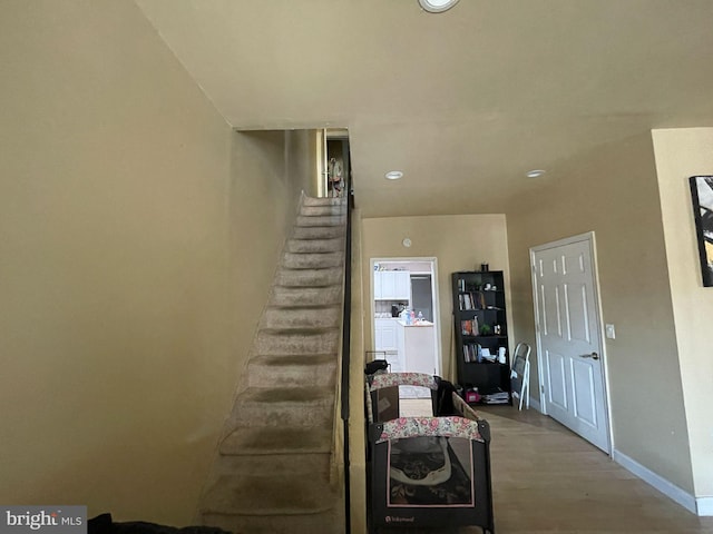 3102 N Taylor St, Philadelphia, PA 19132 - staircase featuring baseboards and wood finished floors