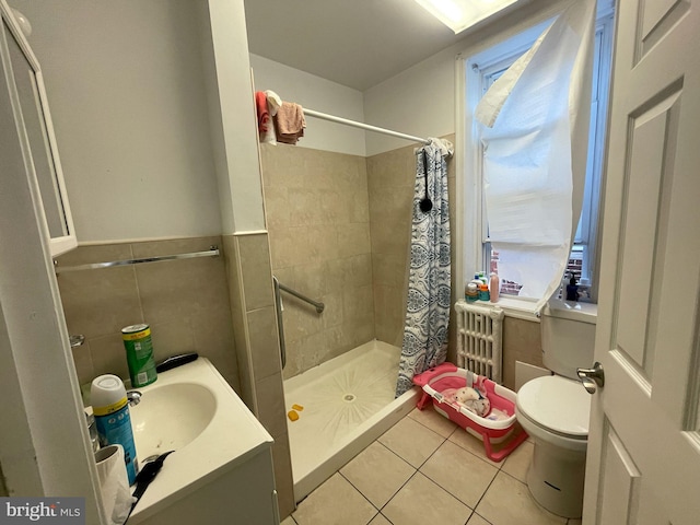 3102 N Taylor St, Philadelphia, PA 19132 - bathroom featuring tile patterned floors, a shower stall, vanity, and tile walls