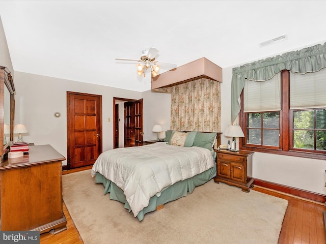 5100 Brook Green Rd, Baltimore, MD 21229 - bedroom with hardwood / wood-style floors and ceiling fan