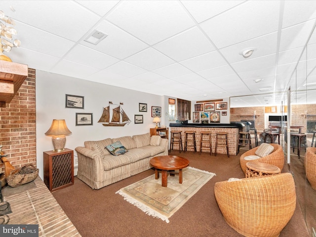 5100 Brook Green Rd, Baltimore, MD 21229 - carpeted living room with a paneled ceiling