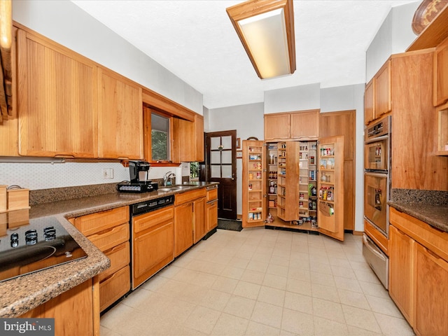 5100 Brook Green Rd, Baltimore, MD 21229 - kitchen with dishwasher, black electric stovetop, and a warming drawer