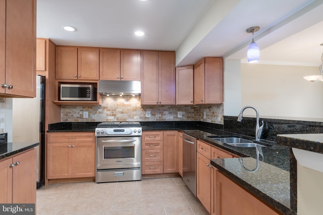 1906 Duffield Ln, Alexandria, VA 22307 - kitchen with stainless steel appliances, under cabinet range hood, tasteful backsplash, light tile patterned flooring, and dark stone counters