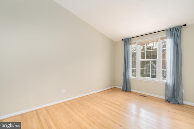 1906 Duffield Ln, Alexandria, VA 22307 - unfurnished room featuring wood finished floors and lofted ceiling