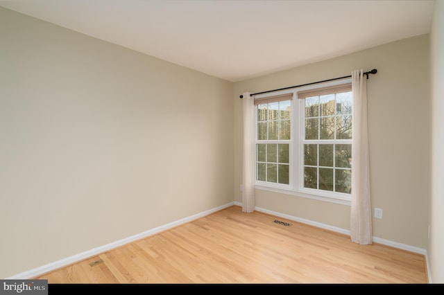 1906 Duffield Ln, Alexandria, VA 22307 - empty room with wood finished floors and baseboards