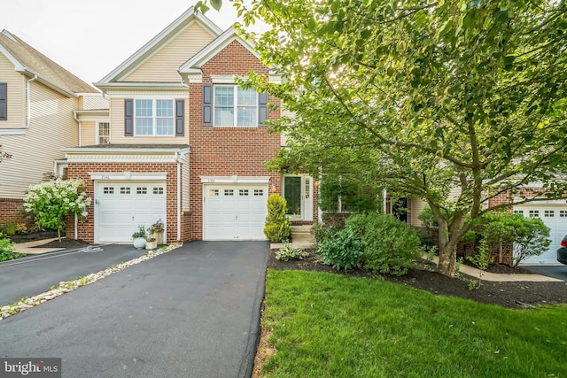 2350 Rosemont Ter, Furlong, PA 18925 - view of front of house featuring brick siding, driveway, and a garage