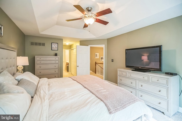 2350 Rosemont Ter, Furlong, PA 18925 - bedroom with a tray ceiling, ensuite bath, and ceiling fan