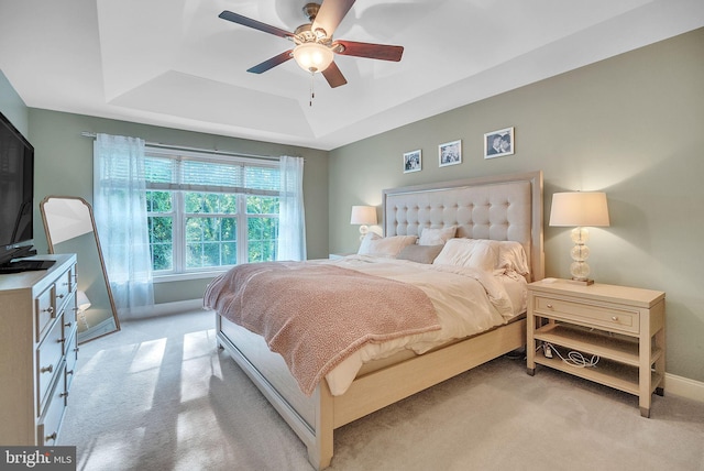 2350 Rosemont Ter, Furlong, PA 18925 - bedroom with light carpet, a tray ceiling, and a ceiling fan