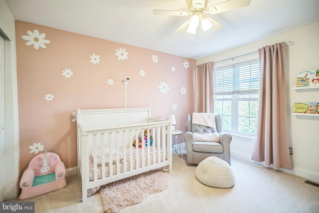 2350 Rosemont Ter, Furlong, PA 18925 - carpeted bedroom with a crib, wallpapered walls, and a ceiling fan